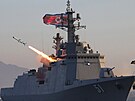 V�dce KLDR Kim �ong-un spole�n� s vysokými p�edstaviteli ministerstva obrany a...