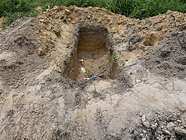 Na h�bitov� ve stát� Trinidad a Tobago policie na�la t�la nejmén� 50 malých...