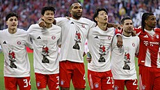 Fotbalisté Bayernu Mnichov slaví zisk mistrovského titulu.