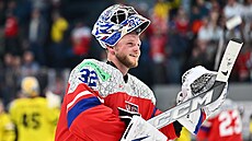 Gólman Josef Ko�ená� slaví triumf nad �védy.