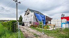 Rekonstrukce obecního ú�adu, kde by m�la vzniknout d�tská skupina, Tetín,...