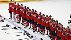 Nor�tí hokejisté zpívají hymnu po senza�ním vít�zství 3:2 nad favorizovaným...