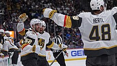 Dylan Coghlan, Shea Theodore a Tomá� Hertl (zleva) oslavují gól Vegas Golden...