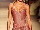 MIAMI BEACH, FLORIDA - MAY 29: Emily Hughes walks the runway for FAE Runway...