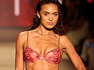MIAMI BEACH, FLORIDA - MAY 29: Grace Ann Nader walks the runway for FAE Runway...