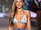 MIAMI BEACH, FLORIDA - MAY 31: A model walks the runway for Voglia Swimwear at...