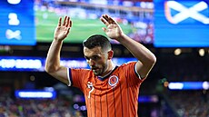 Skotský zálo�ník John McGinn slaví svou branku proti Haiti.