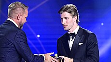Branká� Luká� Dostál obsadil v anket� Zlatá hokejka 2026 celkov� �esté místo.