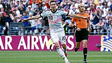 Belgi�an Hans Vanaken slaví trefu v osmifinále mistrovství sv�ta proti USA.