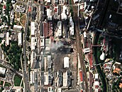 Satelitní snímek budovy 34 ve Zlín� zasa�ené ni�ivým po�árem. (10. �ervenec...
