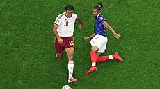 Francouzský fotbalista Michael Olise �pan�lský Rodri v utkání na MS ve fotbale...