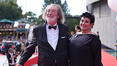 Herec Bolek Polívka s man�elkou na záv�re�ném ceremoniálu KVIFF (11. �ervence...