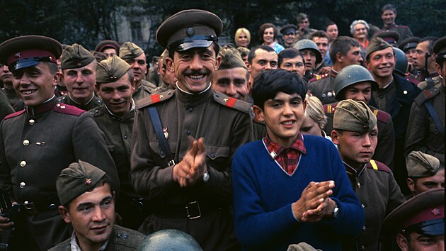 (Original Caption) Members of the Russian Army are shown as they watch Russian...