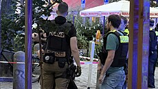 V berlínské restauraci Atlas se ozvaly t�i výst�ely. Pravd�podobn� je na míst�...