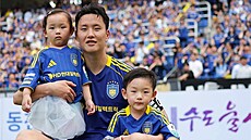 Fotbalista Jung Seung-hyun s dcerou a synem