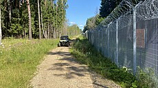 Loty��tí pohrani�níci patrolují podél hranice s B�loruskem u obce Silene. (11....