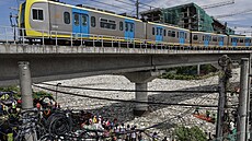 Povod�ová voda z Manilského zálivu p�enesla v�t�inu odpad� do metropolitní...