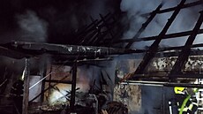 Po�ár zachvátil d�m v Rynolticích. (23. - 24. srpna 2026)