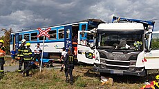 Vlak v Prost�jov� se srazil s vozem technických slu�eb a vykolejil. (2. zá�í...