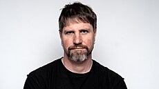 Petr Kolá�