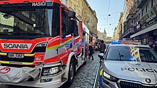 P�i po�áru venkovních plynových kamen ve Vodi�kov� ulici v centru Prahy se...