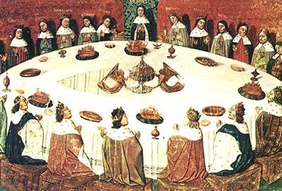 Artu�ovi rytí�i zasedají okolo kulatého stolu na hrad� Camelotu.