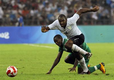 Nigérie (v zeleném) si zajistila postup v zápase s USA. 