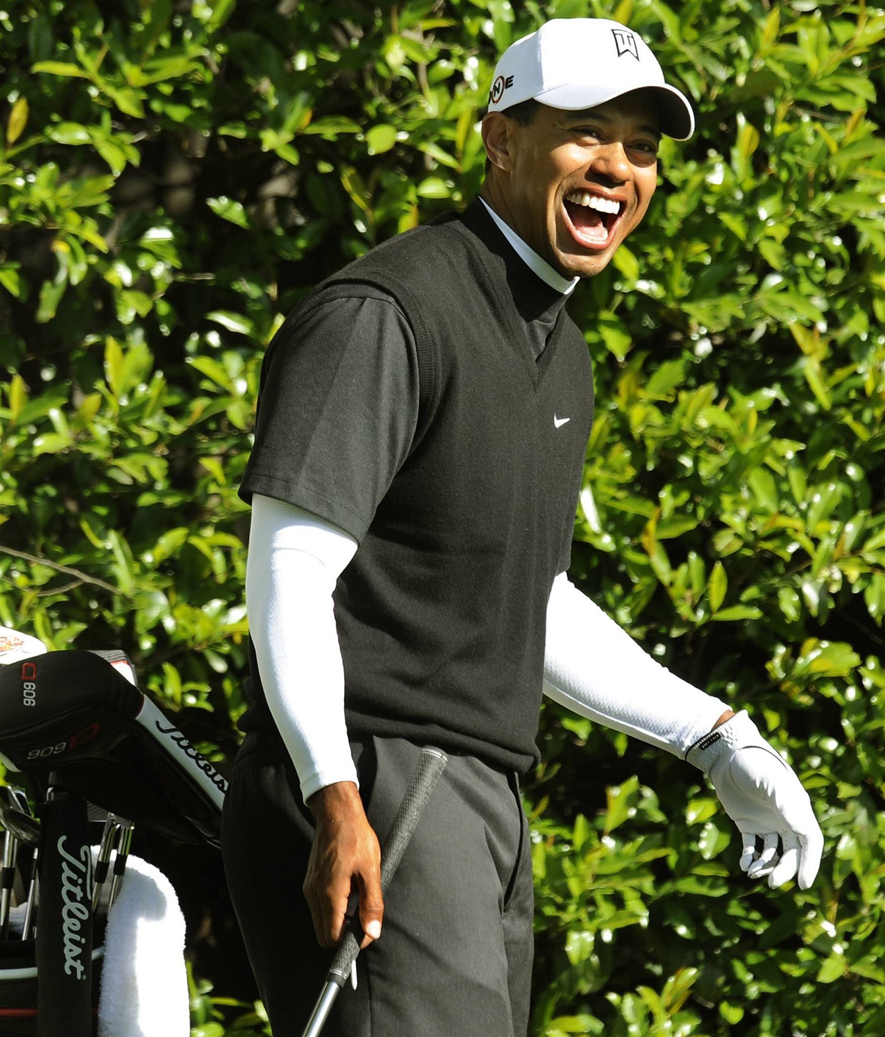Tiger Woods pi tréninku na turnaj Masters v August.