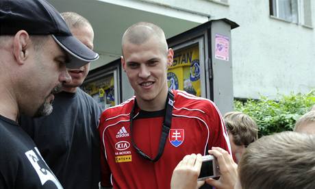 Slovenská reprezentace v Pieanech (Martin krtl s fanouky).