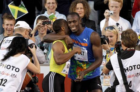 Tyson Gay (vlevo) a Usain Bolt