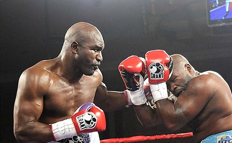 Evander Holyfield a Sherman Williams.