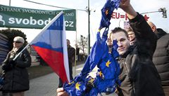 Protest proti prezidentu Evropské unie Hermanu Van Rompuyovi.