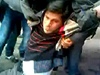 Postelený syrský demonstrant 