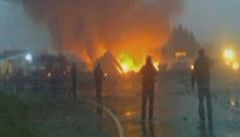 Snímek p�evzatý z TV vysílání ukazuje ho�ící vrak ruského letadla.