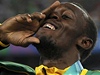 Usain Bolt se zlatou medailí.