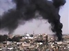 Vojáci ostelují Homs (snímek pevzatý z TV vysílání)