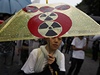 Japonka na demonstraci proti optovnému putní jaderných elektráren