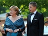 Nmecká kancléka Angela Merkelová na festivalu se svým manelem Joachimem Sauerem.