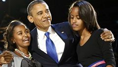 Staronový prezident Barack Ombama se svými dcerami Maliou (vpravo) a Sashou. 