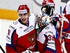Radost ruských hokejist brankáe Konstantina Barulina (vpravo) a Jevgenije Malkina  