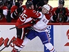 Hokejista Ottawy Senators Chris Neil (vlevo) a Jarred Tinordi z Montrealu Canadians