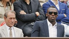 Utkání pihlíel i atlet Usain Bolt (vpravo)