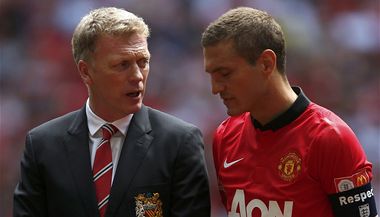 Trenr fotbalist Manchesteru United David Moyes a Nemanja Vidi