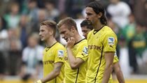 Fotbalist Dortmundu, zleva Marco Reus, Jakub Baszczykowski a Neven Suboti