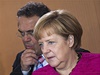 Angela Merkelová s nmeckým ministrem vnitra Hansem-Peterem Friedrichem 