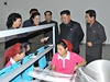 Kim ong-un na návtv textilní továrny