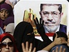 Soud s Mursím doprovázely demonstrace stoupenc Muslimského bratrstva.