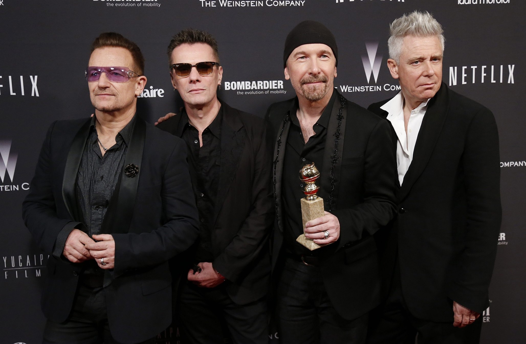 U2 Band. U2 солист. Солист группы u2. Ю ту группа.