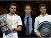 Stanislas Wawrinka (vlevo) a Rafael Nadal s trofejemi.
