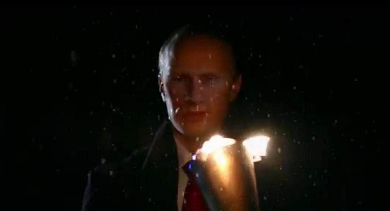 Putin s olympijskou pochodní